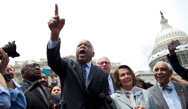 Rep. John Lewis (D-GA) speaks on Capitol Hill in Washington, D.C., on June 23, 2016, after House Democrats ended their sit-in protest on gun violence. (AP/Carolyn Kaster)