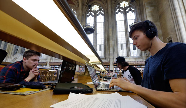 University of Washington students study in the Suzzallo Library in Seattle, April 2013. (AP/Elaine Thompson)