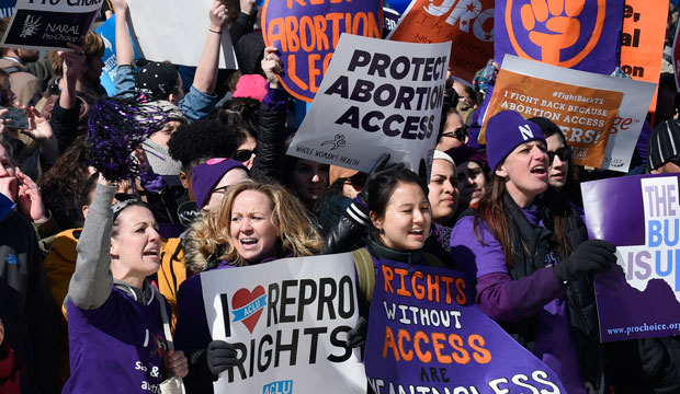 Pro-abortion rights protesters rally outside the U.S. Supreme Court in Washington, Wednesday, March 2, 2016. (AP/Susan Walsh)
