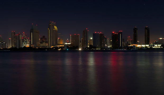 This September 8, 2011, photo shows a darkened San Diego skyline from Coronado, California, during a power outage. (AP/Mark J. Terrill)