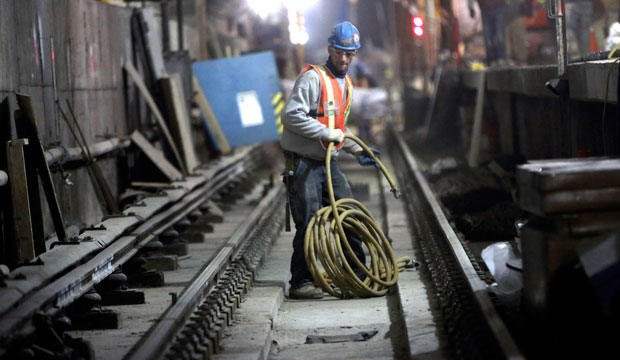 A contractor works on a construction project in New York, January 2013. (AP/Mary Altaffer)