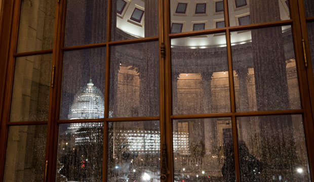 The Capitol in Washington, D.C., is illuminated during a thunderstorm, February 2016. (AP/J. Scott Applewhite)