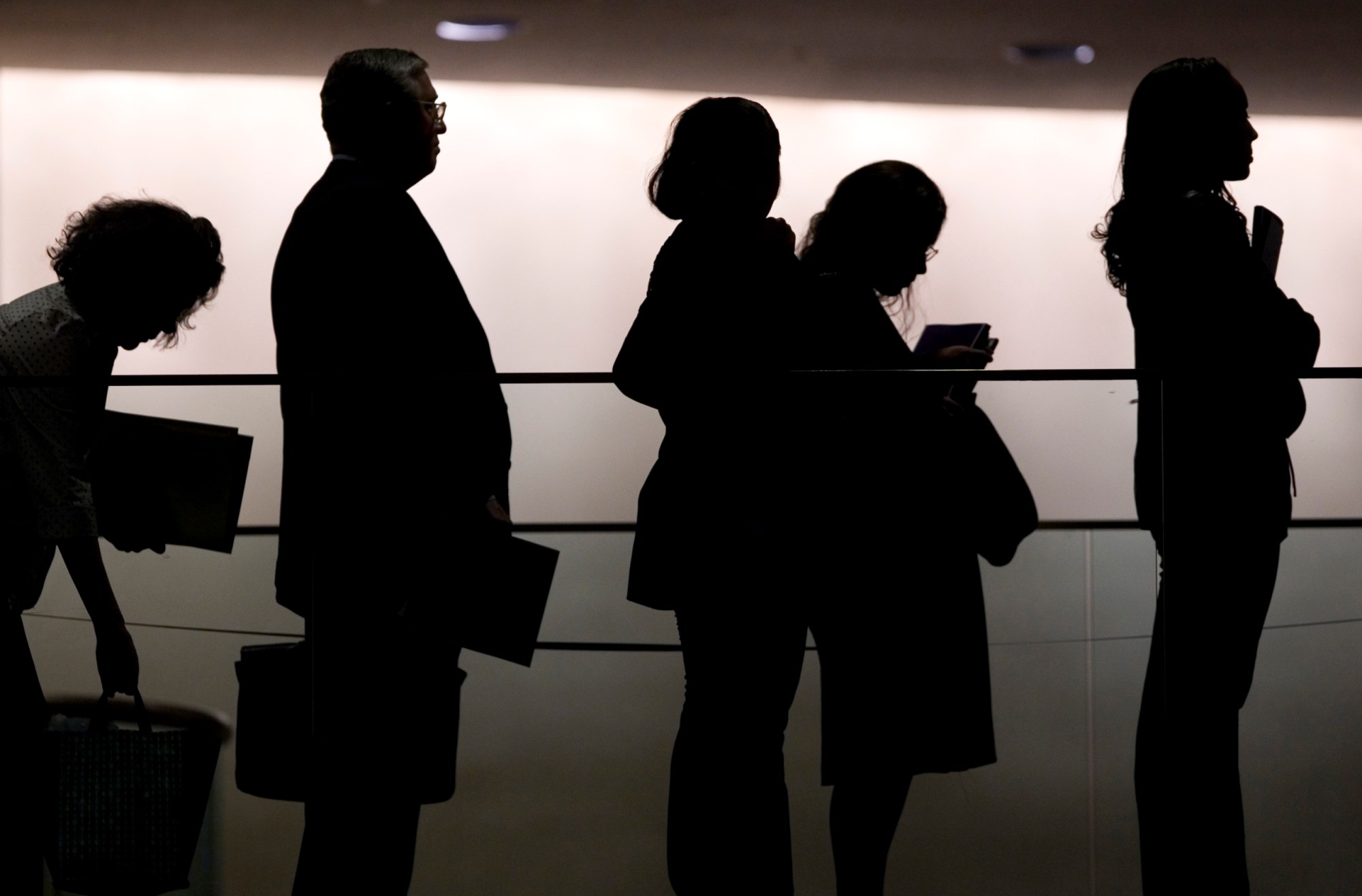 Job seekers join a line at a job fair in New York on March 5, 2009. (AP/Mark Lennihan)