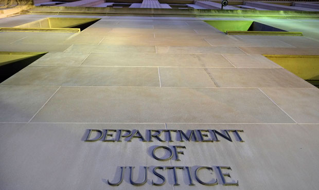 The U.S. Department of Justice headquarters building is photographed early in the morning on May 14, 2013. (AP/J. David Ake)