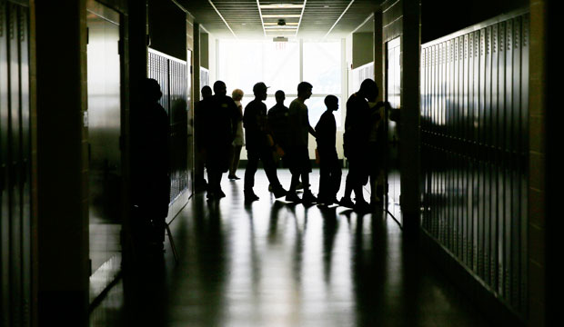 Students walk through the halls during an open house for incoming freshman and transfer students at a high school in Philadelphia, August 2013. (AP/Matt Slocum)