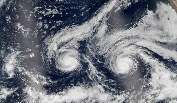 This satellite image released by NASA shows Hurricane Madeline and Hurricane Lester over the Pacific Ocean, August 2016. (AP/NASA)