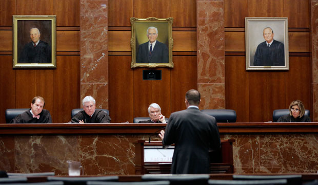 Texas Supreme Court justices listen as an attorney argues in a case, November 2015. (AP/Eric Gay)