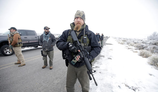 A man stands guard at the Malheur National Wildlife Refuge near Burns, Oregon, on January 9, 2016. (AP/Rick Bowmer)