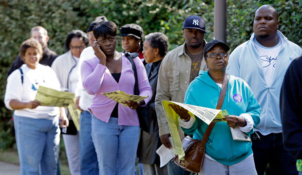 Voters stand in line at an early voting site in Charlotte, North Carolina, in October 2008. (AP/Chuck Burton)