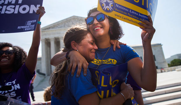 Abortion advocates celebrate during a rally at the U.S. Supreme Court in Washington, D.C., on June 27, 2016. (AP/Evan Vucci)