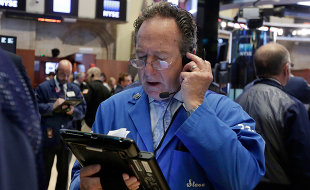 A trader works on the floor of the New York Stock Exchange, September 26, 2016. (AP/Richard Drew)