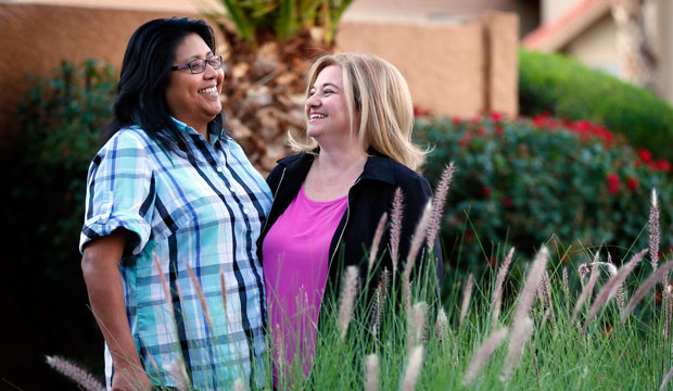 Cleo Pablo and her wife, Tara Roy-Pablo, stand outside their home in Phoenix, Arizona, on November 9, 2015. (AP/Matt York)