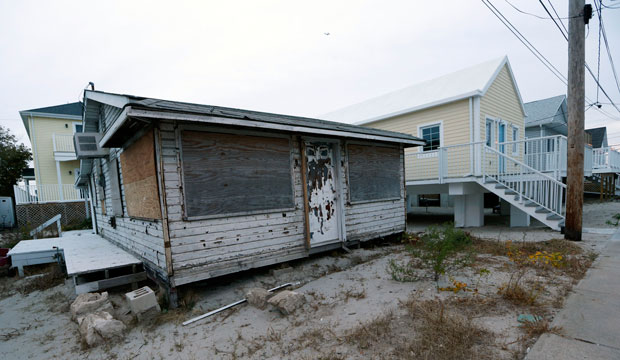 A boarded home damaged by Superstorm Sandy sits in the Breezy Point neighborhood of New York, on October 27, 2015. (AP/Kathy Willens)