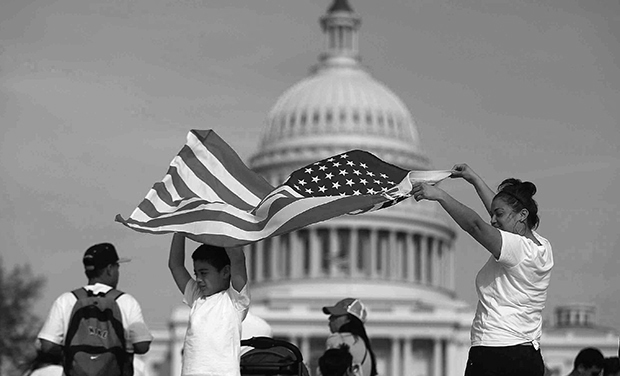 Jissela Centeno and her son Matthew Pineda of Arlington, Va., whose family is from Honduras, participates in a rally for immigration reform at the U.S. Capitol in Washington, Wednesday, April 10, 2013. (AP Photo/Charles Dharapak)