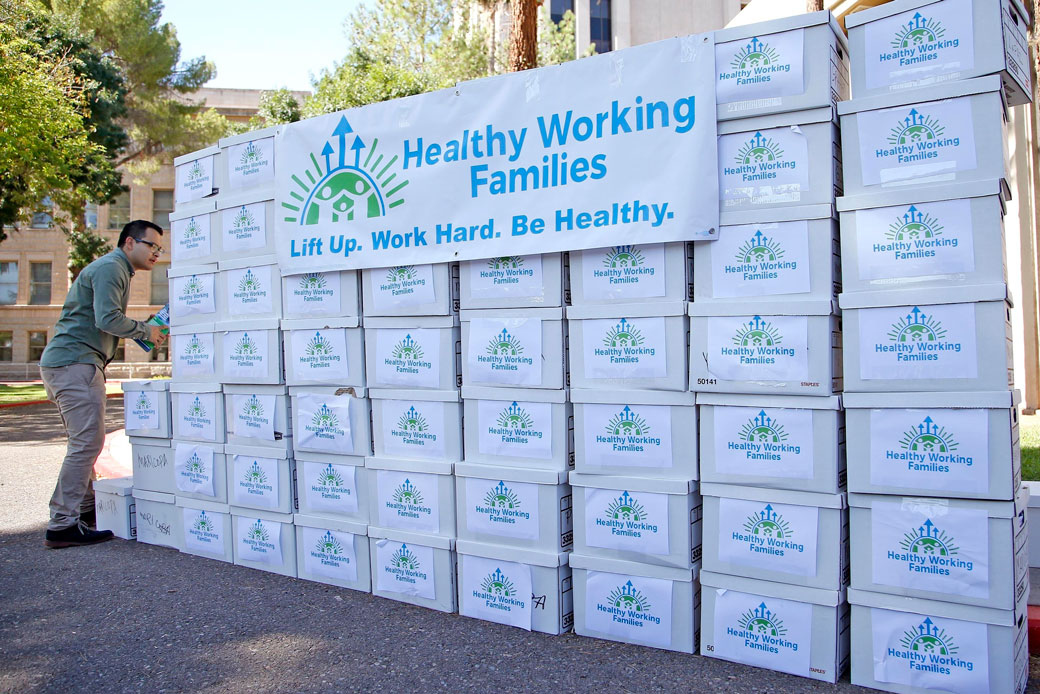 Boxes containing signatures gathered by the Arizona Healthy Working Families Initiative group sit on display in Phoenix, Arizona on  July 7, 2016. (AP/Ross D. Franklin)