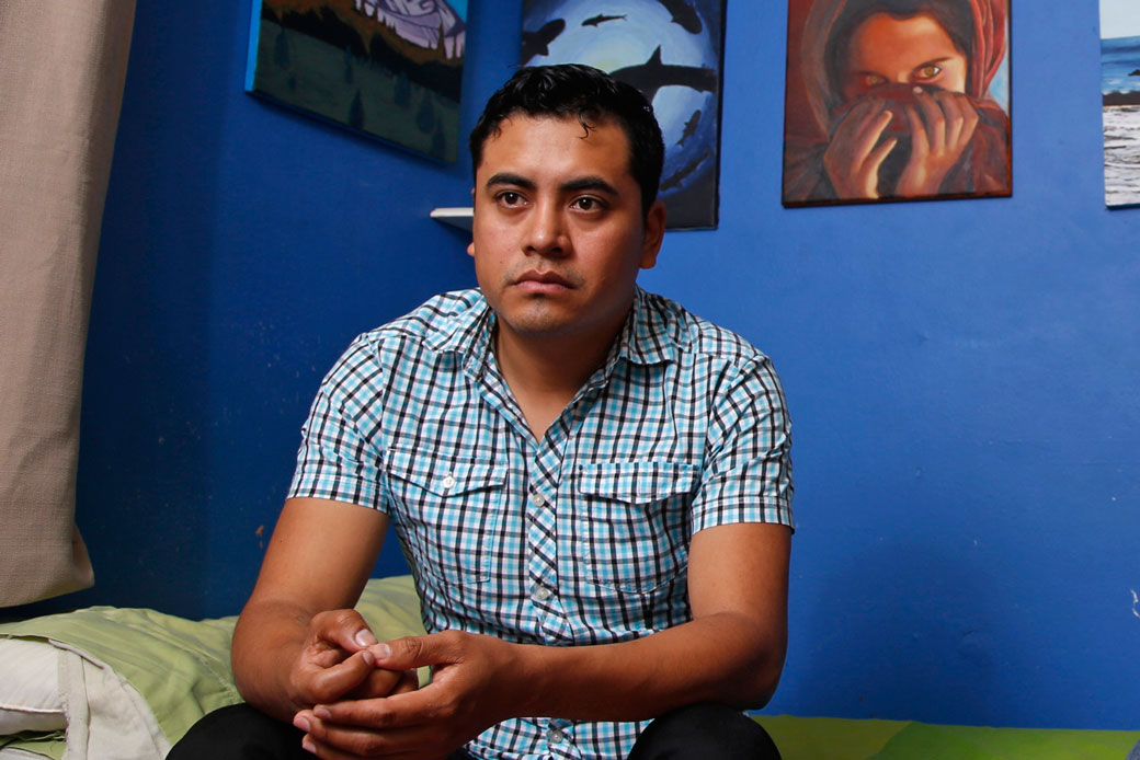 A young immigrant from Mexico poses for a portrait at his home in Paramount, California. (AP/Damian Dovarganes)