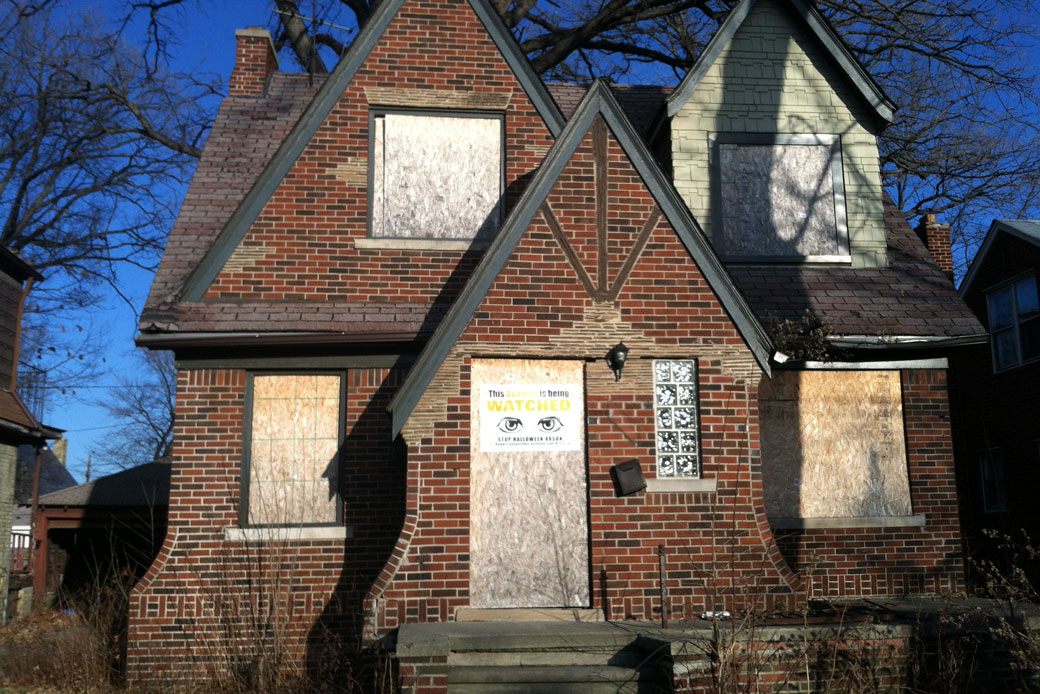 This December 3, 2014, photo shows an abandoned house in Detroit, one of thousands of dilapidated buildings in Detroit. (AP/Beth J. Harpaz)