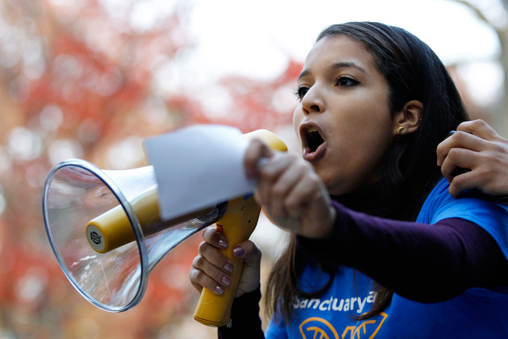 College student and DACA recipient Carimer Andujar joins a protest against President-elect Donald Trump on November 15, 2016. (AP/Mel Evans)