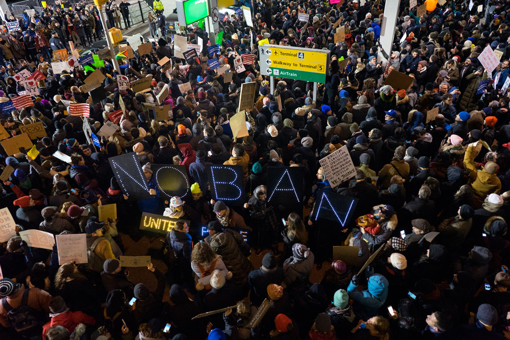 Protesters assemble at John F. Kennedy International Airport in New York, Saturday, January 28, 2017, after two Iraqi refugees were detained while trying to enter the country. (AP/Craig Ruttle)