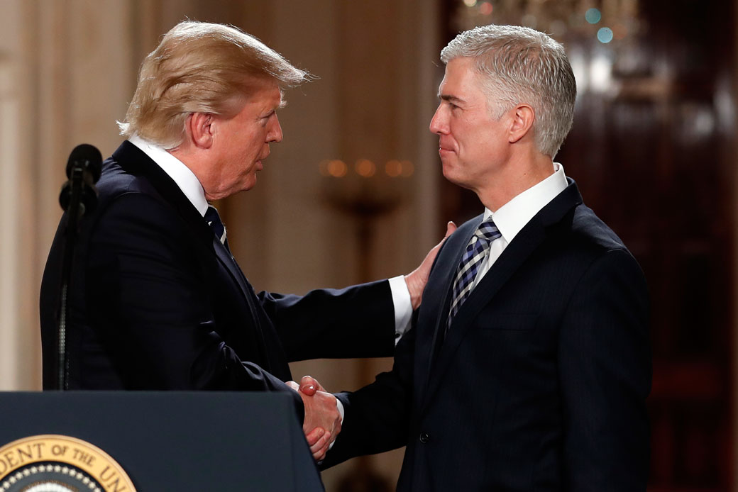President Donald Trump shakes hands with Judge Neil Gorsuch in the White House on January 31, 2017. (AP/Carolyn Kaster)