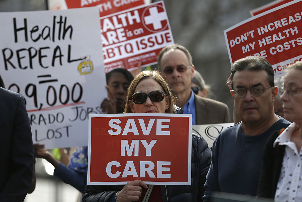 Supporters of the Affordable Care Act gather for a rally, organized by the national Save My Care Bus Tour, on the State Capitol steps in Denver, February 7, 2017. ((AP/Brennan Linsley))