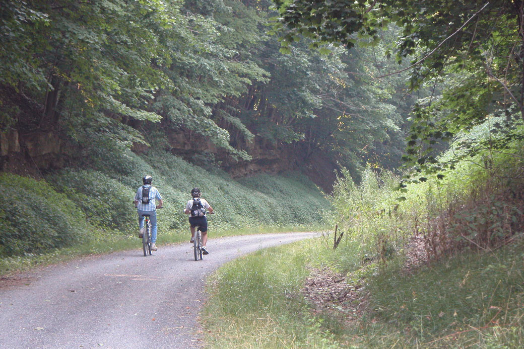 A couple rides bicycles on the Allegheny Highlands Trail near Frostburg, Maryland. (AP/John A. Bone)