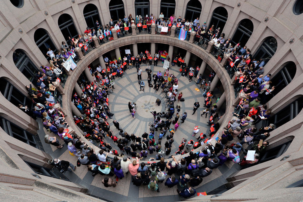 Members of the transgender community and others protest in the exterior rotunda at the Texas state capitol, March 2017. (AP/Eric Gay)