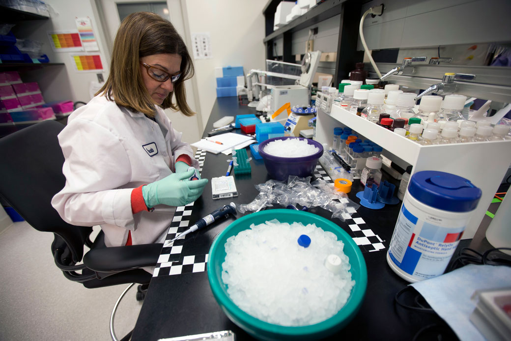 A scientist conducts research to discover new HIV drugs in Pennsylvania in February 2013. (AP/Matt Rourke)