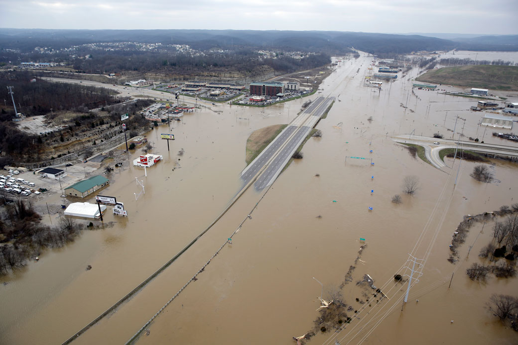 Flood water covers Interstate 44 in Valley Park, Missouri, in December 2015, after two wastewater treatment plants near St. Louis failed. (AP/Jeff Roberson)