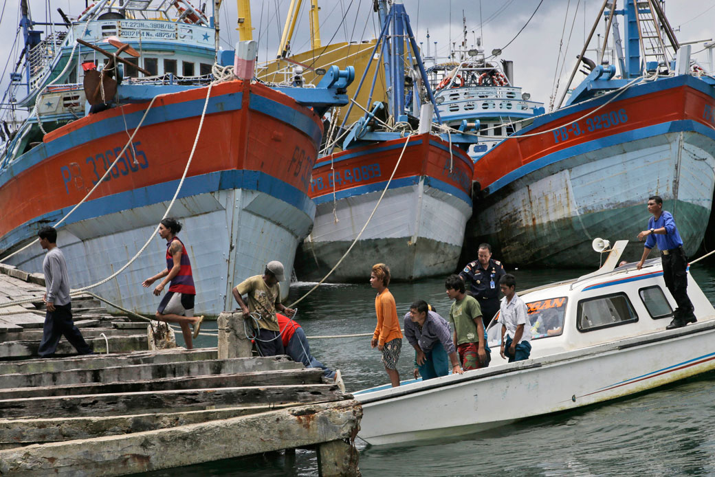 Burmese fishermen arrive at the compound of Pusaka Benjina Resources, April 2015. (AP/Dita Alangkara)