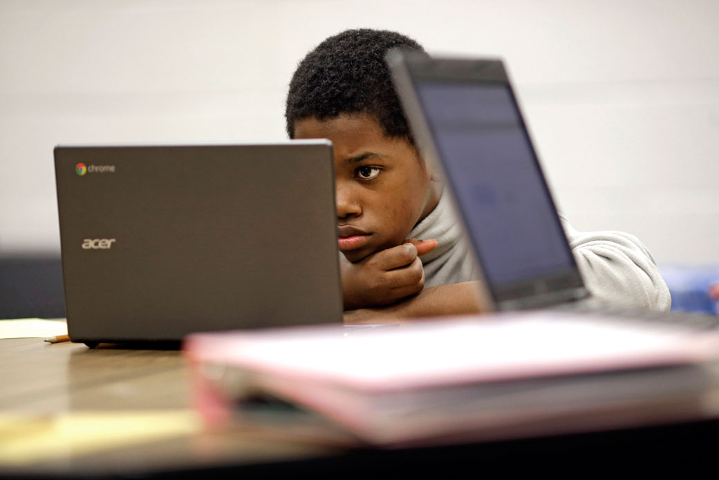 A student reads test questions on a laptop computer at Annapolis Middle School in Annapolis, Maryland, on February 12, 2015. (AP/Patrick Semansky)