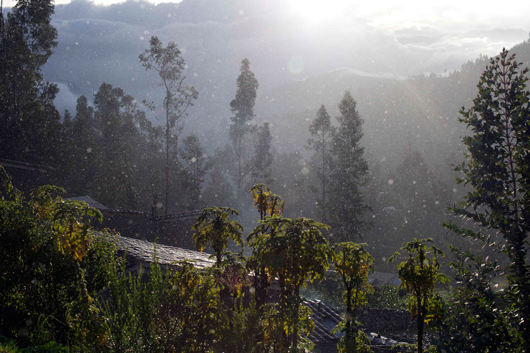 Rain drops illuminated by the sun, fall over Pompei valley in Huaraz, Peru, on December 3, 2014. (AP/Rodrigo Abd)