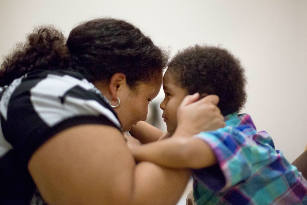 A mother plays with her 5-year-old son at the Marcus Autism Center in Atlanta, on September 18, 2013. (AP/David Goldman)