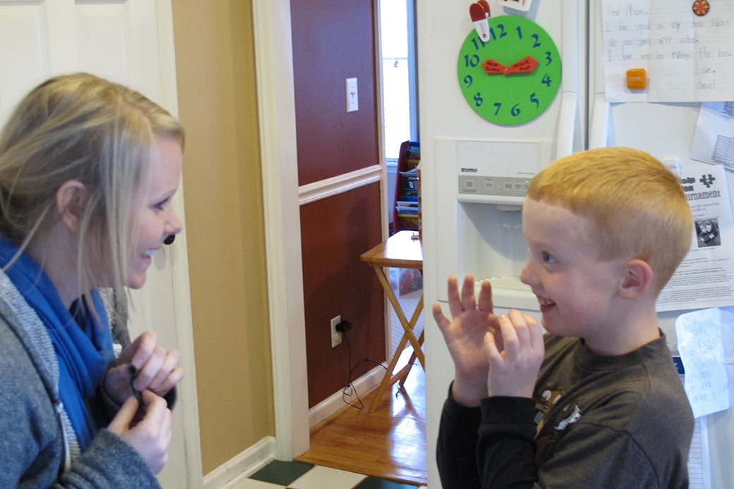 A young boy plays with his therapist in his home in York, South Carolina. (AP/Jeffrey Collins)