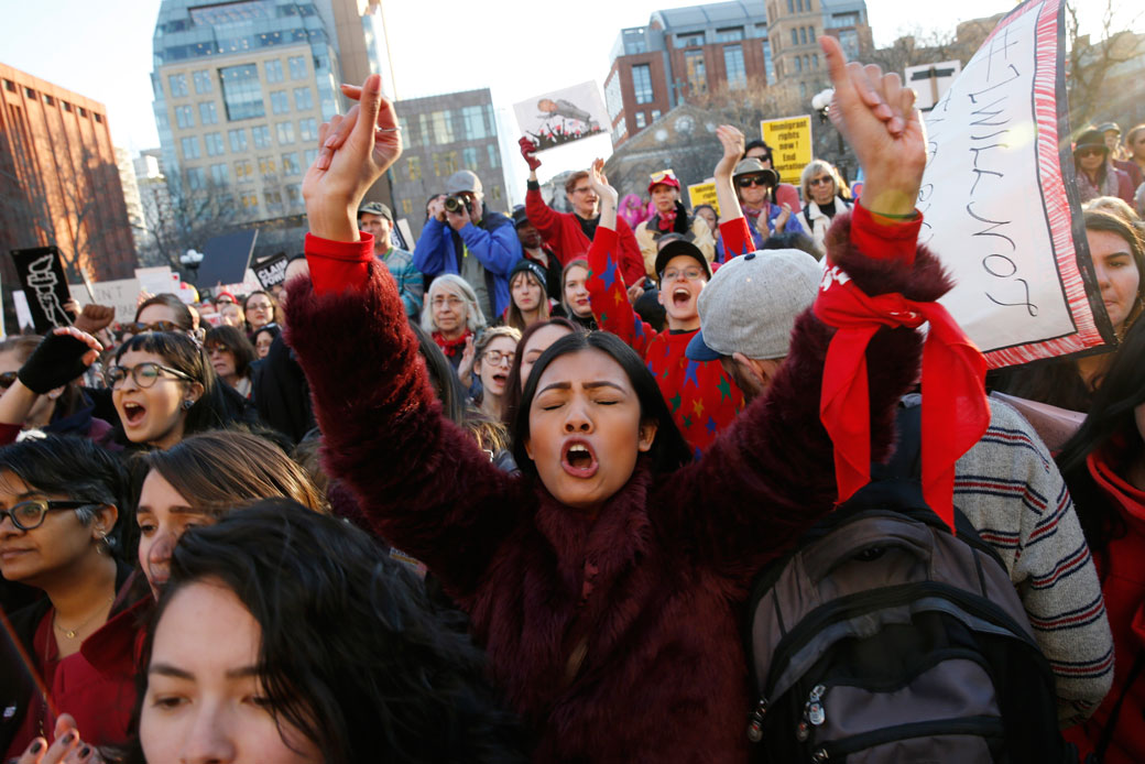 A woman participates in a rally and march as part of International Women's Strike NYC, a coalition of dozens of grassroots groups and labor organizations on International Women's Day, Wednesday, March 8, 2017, in New York. (AP/Kathy Willens)