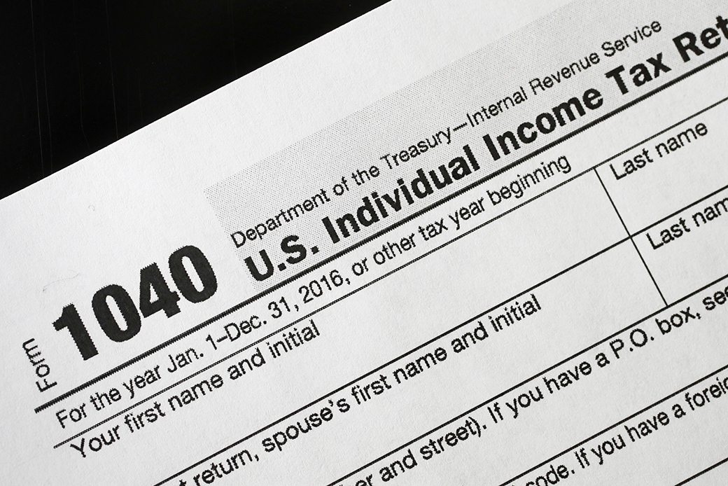 A 1040 tax form appears on display in New York. (AP/Mark Lennihan)