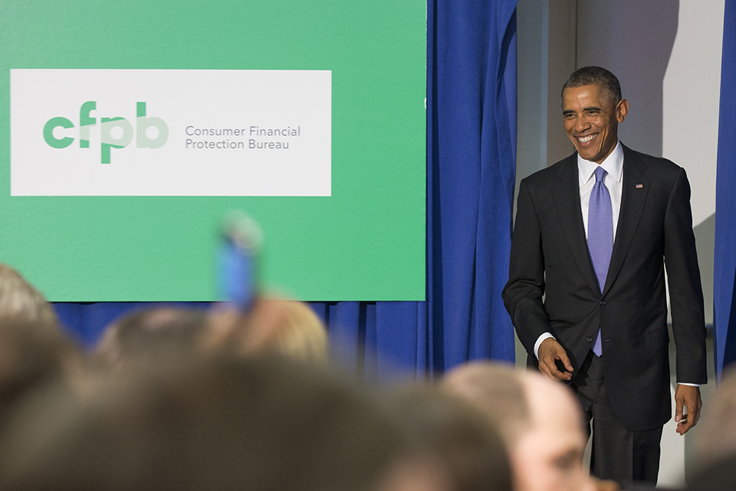 President Barack Obama smiles as he arrives to deliver remarks at the Consumer Financial Protection Bureau, October 17, 2014, in Washington. (AP/Evan Vucci)