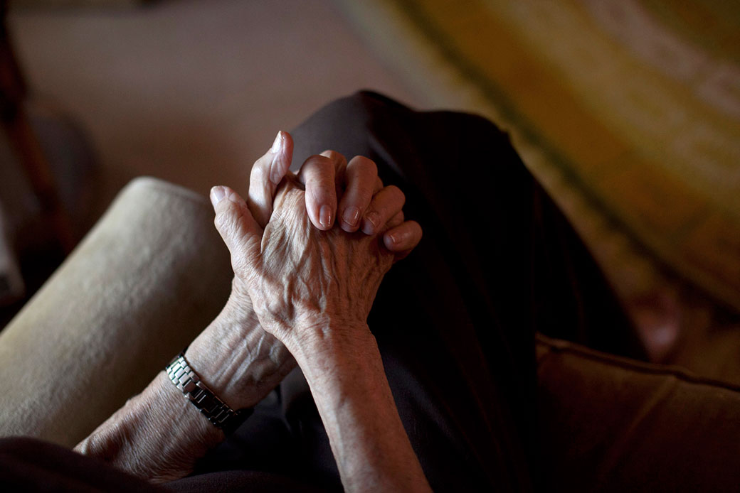 Minka Disbrow clasps her hands together on December 28, 2011, in San Clemente, California. (AP/Jae C. Hong)