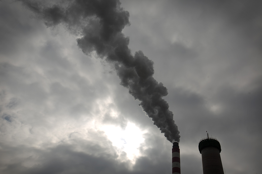 Smoke and steam rise from the smokestack of a coal-fired power plant near Ordos in northern China's Inner Mongolia Autonomous Region, June 2015. (AP/Mark Schiefelbein)