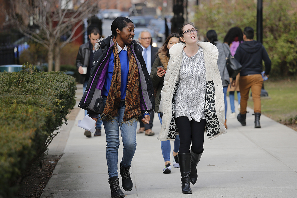 Students walk across a campus for class, February 2017. (AP/Bebeto Matthews)