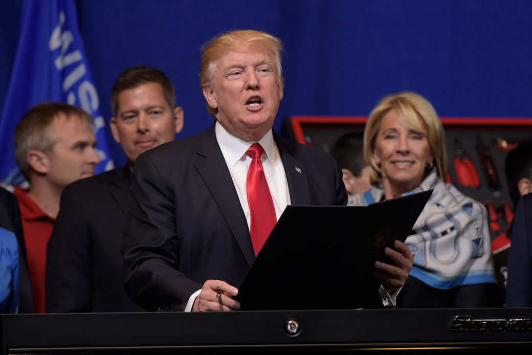 President Donald Trump and Education Secretary Betsy DeVos are seen in April 2017. (AP/Susan Walsh)