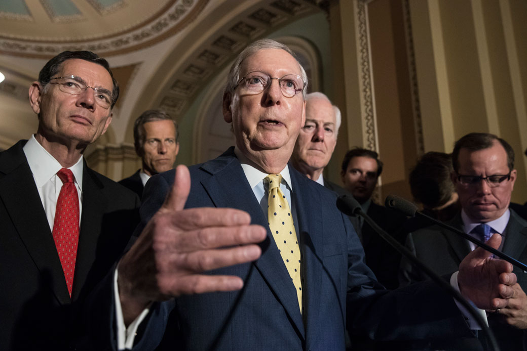Senate Majority Leader Mitch McConnell, (R-KY), joined by, from left, Sen. John Barrasso (R-WY), Sen. John Thune (R-SD), and Majority Whip John Cornyn (R-TX), speaks following a closed-door strategy session, at the Capitol in Washington, June 20, 2017. (AP/J. Scott Applewhite)
