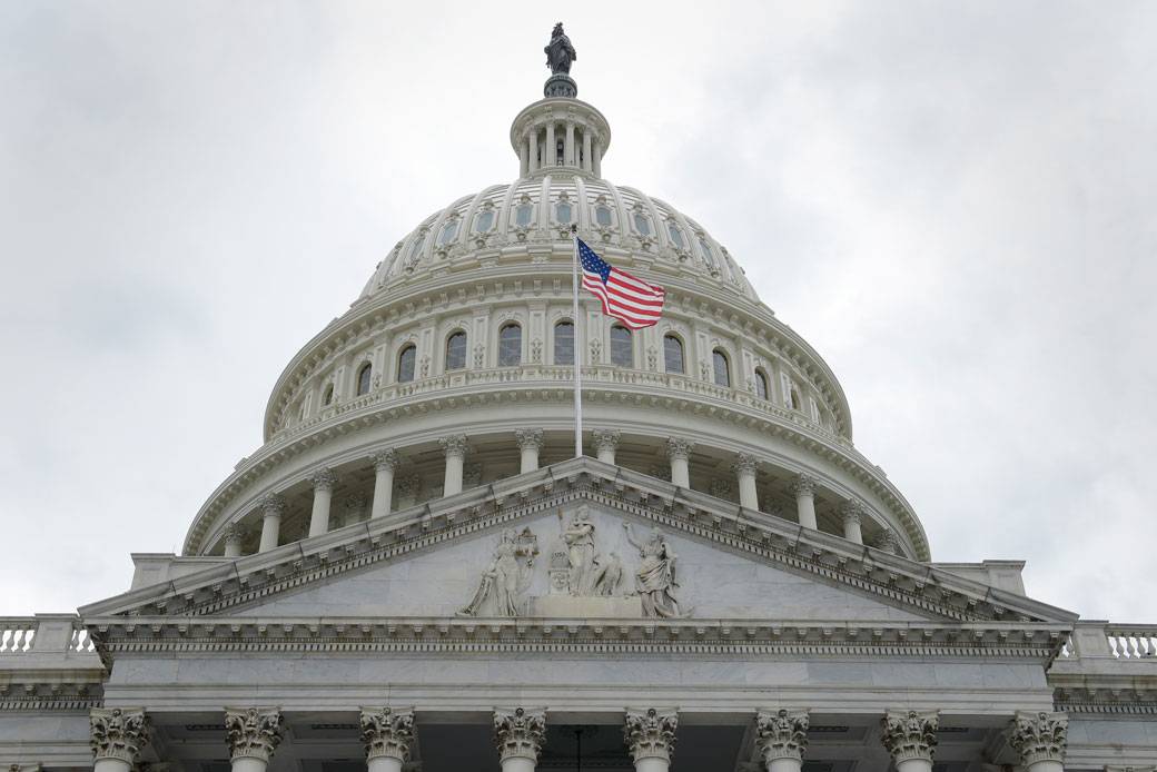 The U.S. flag flies in front of the Capitol dome on Capitol Hill in Washington, May 2017. (AP/Susan Walsh)