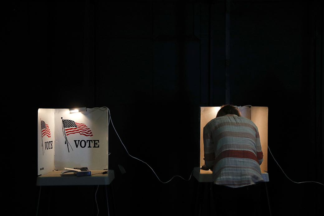 A person votes at a polling station inside the Teatro Frida Kahlo Theater, March 7, 2017, in Los Angeles. (AP/Jae C. Hong)