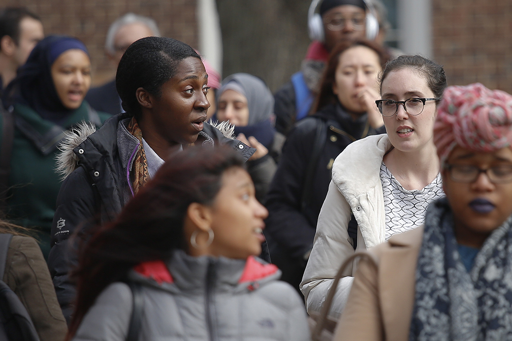 College students walk across campus for class, February 2017. (AP/Bebeto Matthews)