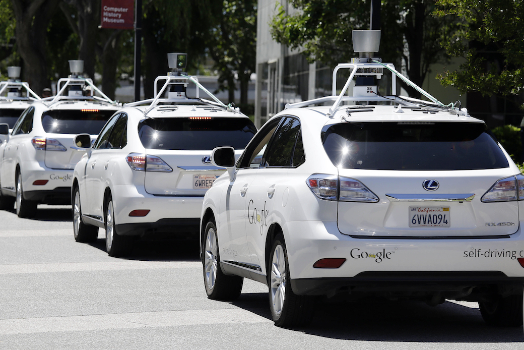 Google's self-driving cars line up outside the Computer History Museum in Mountain View, California. (AP/Eric Risberg)