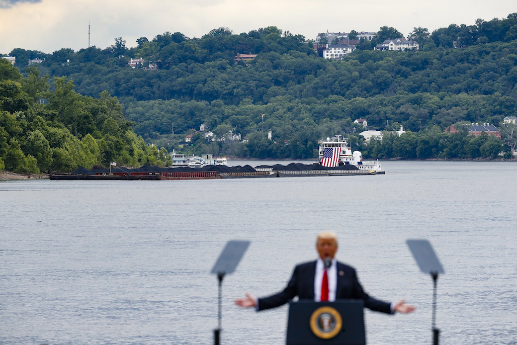 President Donald Trump holds a rally near a coal barge in Cincinnati in June 2017. (AP/John Minchillo)