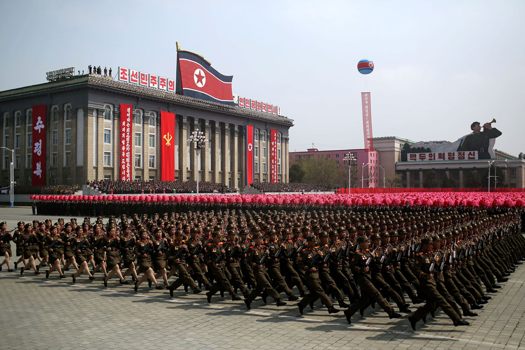 In this Saturday, April 15, 2017, photo, soldiers march across Kim Il Sung Square during a military parade in Pyongyang, North Korea. (AP/Wong Maye-E)