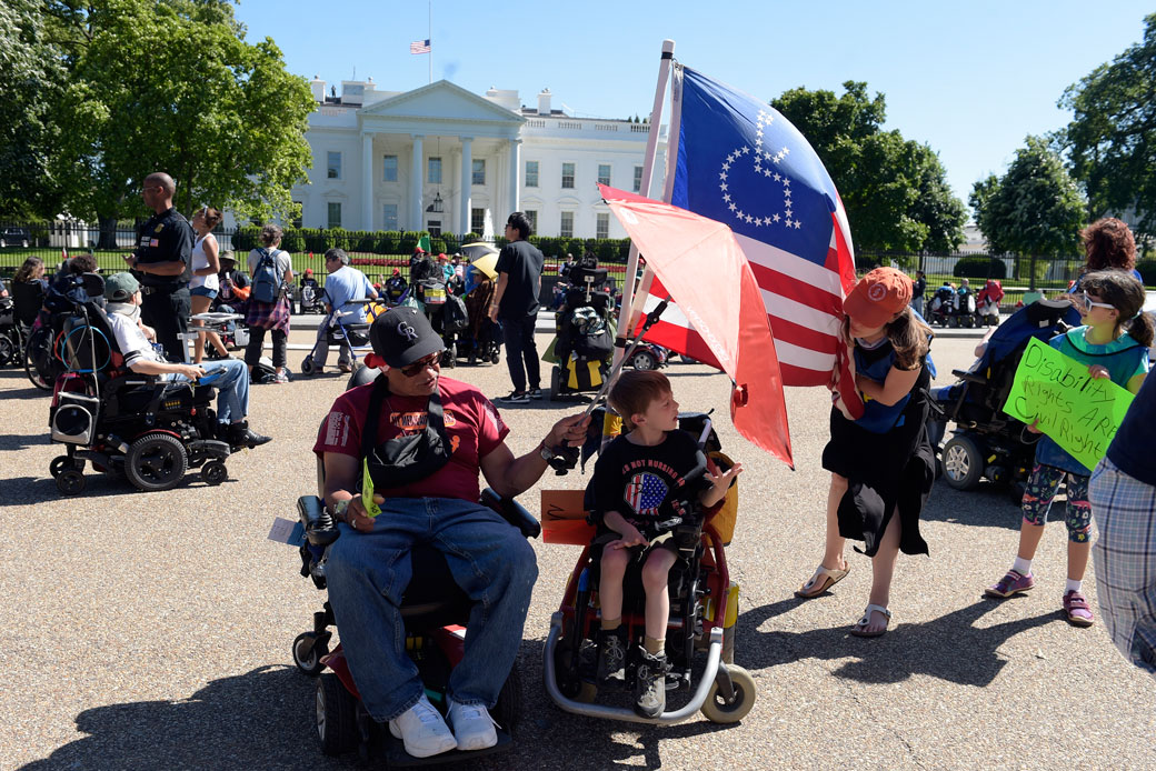 Protesters supporting people with disabilities gather outside the White House in Washington, May 15, 2017. (AP/Susan Walsh)