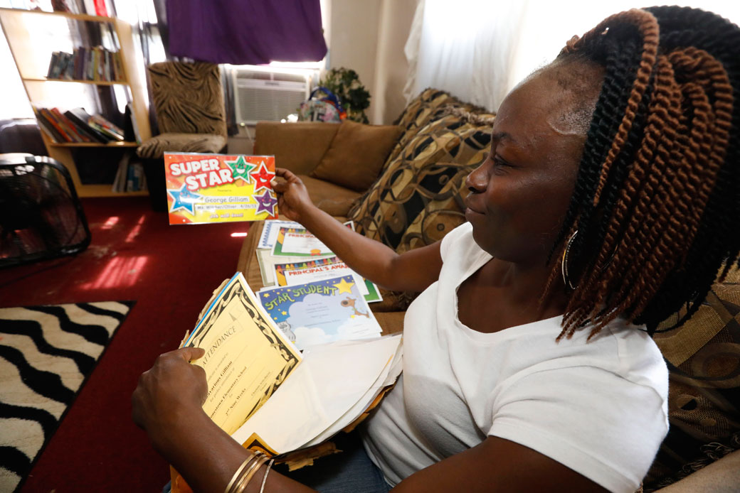 Otibehia Allen of Jonestown, Mississippi, takes joy in her children's academic accomplishments, July 24, 2017. (AP/Rogelio V. Solis)